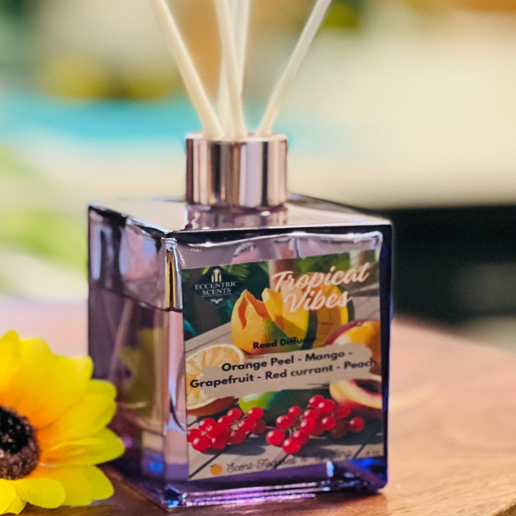 Tropical Vibes reed diffuser styled in sunlit home setting with fresh vibrant fragrance